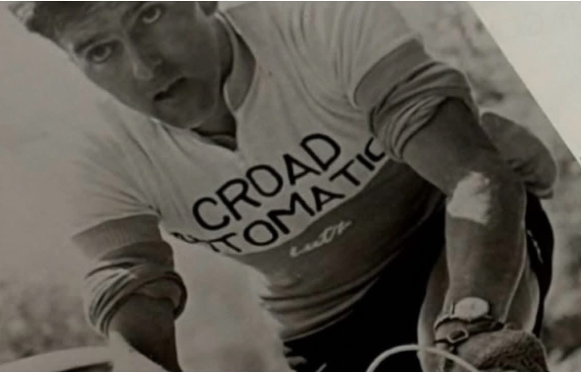 Historic black-and-white photograph of a road cyclist wearing a Road Automatic jersey, featured on the SIXTY/8 Bike Box Doug hire page