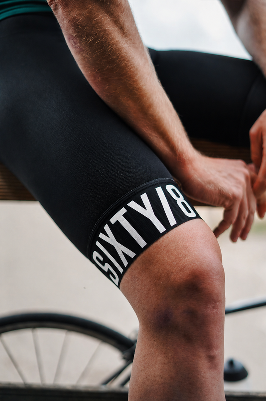 Men’s Black Cycling Bib shorts with White  logo.